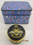 Eastern enamel box and cover with allover pink flowerhead decoration on a blue ground,
