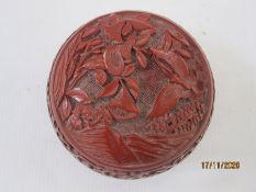 Chinese cinnabar lacquer box, circular and lidded, decorated with columbine and butterfly, 9cm