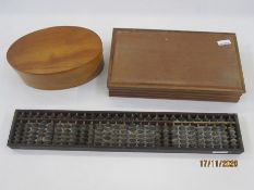 Oval bentwood box and cover, an abacus and one other box (3)