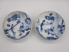 Pair Chinese porcelain saucers with two figures in a garden, six-character mark for Cheng-Hua to
