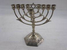 Silver menorah with import marks for Israel Freeman & Son Ltd, London 1960, of typical form, on a