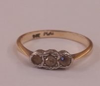 9ct gold three-stone ring set white stones