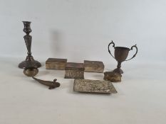 Silver plated candlestick, a two-handled trophy cup, various lidded trinket boxes, a metal carp with