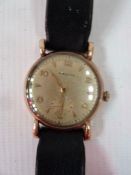 Gentleman's 9ct gold P.Buhre wristwatch, with subsidiary second dial, on leather strap