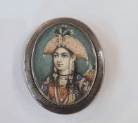 Persian miniature on ivory Head and shoulders portrait of a girl wearing ornate headdress and robes,
