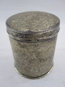 Egyptian silver jar and cover of cylindrical form decorated with scroll work and decorative