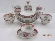 Late 18th century Chinese export porcelain part tea service with pink scale borders and floral spray