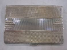 A 1930s Walker and Hall silver cigarette case, rectangular, engine turned decoration, engraved to