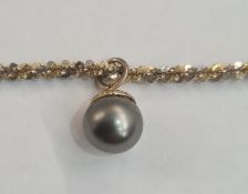 9ct two coloured gold fancy ornate twisted link chain and a  faux pearl pendant, the chain is 9.6g