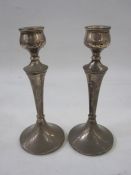 A pair 1960s silver mounted candlesticks, tapering column on circular bases, Birmingham 1963,