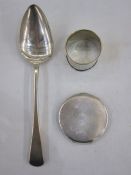 A George III silver table spoon, London 1803, maker Edward Lees, 1.4toz, a napkin ring, engraved '