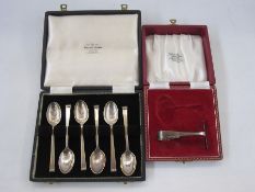 A 1930s cased set of six silver teaspoons, tapered handles with reeded edge, Sheffield 1935, maker