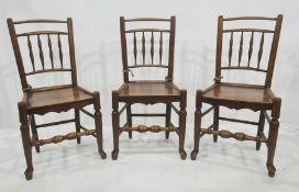 Set of eight country oak and elm railback dining chairs each with quadruple baluster spindles to the