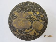 Late 19th/early 20th century Japanese gilt decorated lacquer box, cylindrical and decorated with