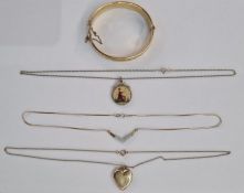 9ct gold and cubic zirconium necklace, chevron design on an integral black curb link chain, gold