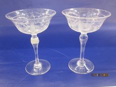 Pair of Walsh Walsh early 20th century large champagne coupes with engraved garland decoration on