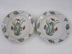 Pair of Delft plates, floral decorated, 22.5cm diameter (2)