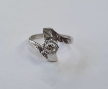 18ct white gold and diamond solitaire ring in twist setting, the single diamond approx. .25 in