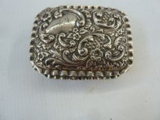 Early 20th century silver snuff box of rococo design, initialled AJ ,Chester 1900, E J Trevitt &