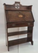 20th century oak student's bureau, the three-quarter galleried top shelf above the inlaid fall,