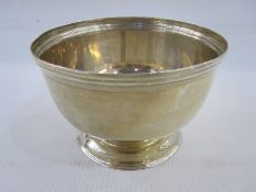 An early 20th century silver bowl, plain form with reeded rim on circular pedestal base, Sheffield