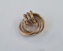 Modern three-colour gold brooch of knot design, marked 750, approx. 17.8g