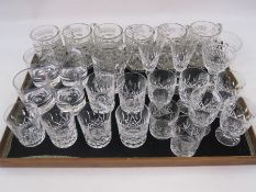 Five Waterford cut glass  pedestal tumblers, collection of cut wines, tumblers and pressed mugs