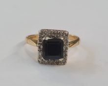 22ct gold, sapphire and diamond dress ring set rectangular sapphire surrounded by small diamonds