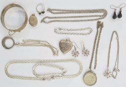 Mid 20th century silver bangle with bark-finish, a silver necklace and matching bracelet of