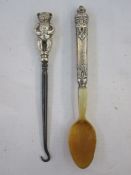 An early 20th century silver handled button hook, bear shaped handle, Birmingham 1909, makers