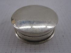 Edwardian silver pill box, circular with beaded edge, Birmingham 1901