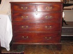 George III oak chest of two short and three long graduated drawers, with cockbead borders, brass