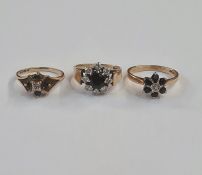 9ct gold, sapphire and diamond dress ring set small diamonds surrounded by six claw set sapphires, a