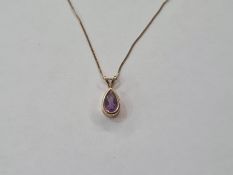 10K gold and amethyst-coloured stone pendant, teardrop-shaped, on fine chain
