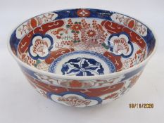 Japanese Imari porcelain bowl with decoration in typical colours of fans in shaped panels amid