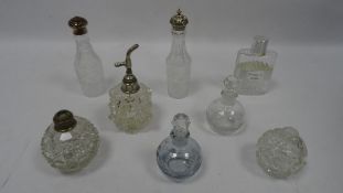 Collection of glass bottles, including silver topped example (Thomas Bradbury and sons,