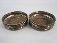 A pair of 20th century silver mounted and wooden wine coasters, circular, London, makers Nat Joseph,