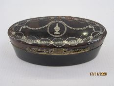 George III tortoiseshell box of oval form, the hinged cover with silver pique work, wirework