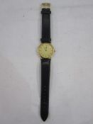 Gentleman's Omega De Ville strap watch, the circular dial with baton markers in gilt metal case