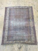 Pink ground rug with allover decoration, stepped border, in pinks, blues and creams, 198cm x 147cm