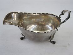 1930s silver sauceboat, scalloped edge, splayed feet, Birmingham 1931, makers Adie Brothers Ltd,