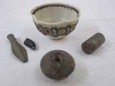 Archaeological interest, a bronze spear head, 4cm long, clay beads with incised decoration, 3cm