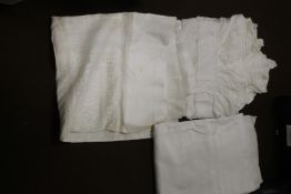 A VINTAGE LINEN TABLECLOTH WITH CHINESE STYLE DRAGON EMBROIDERY TOGETHER WITH TWO OTHER LINEN