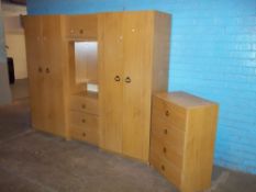 A MODERN FOUR PIECE BEDROOM SUITE