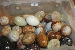 A COLLECTION OF APPROX. 59 STONE MARBLE GRANITE AND ALABASTER EGGS AND BALLS
