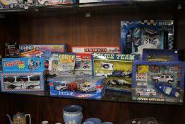 A COLLECTION OF BOXED MODEL POLICE EMEREGENCY VEHICLES ETC.