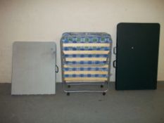 A FOLD UP BED AND TWO FOLD AWAY TABLES