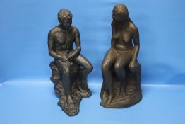 TWO CLAY SEATED FIGURES, MALE AND FEMALE