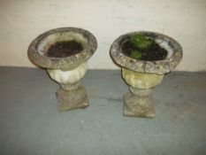 TWO CONCRETE PLANTERS WITH BASES
