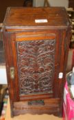 AN OAK SMOKER'S CABINET